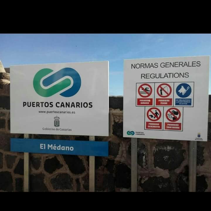 Sobre los carteles que prohíben pescar y bañarse en los muelles de El Médano y Los Abrigos